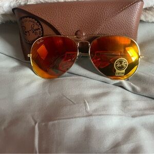 Ray-Ban Gold Frame Sunglasses with Vibrant Orange Lenses